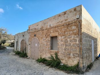 Old building against clear blue sky