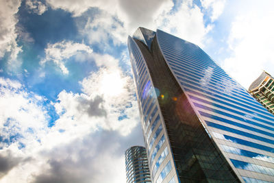 Low angle view of modern buildings against sky