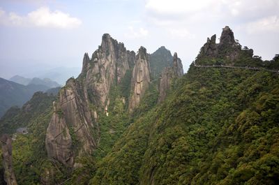 Scenic view of rocky mountains against sky