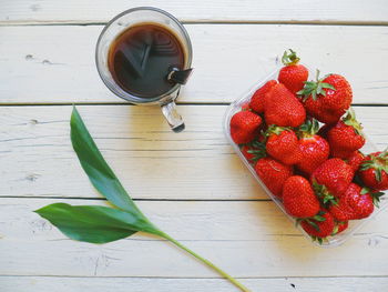 High angle view of strawberries on table
