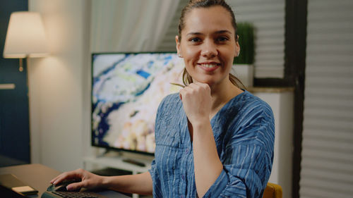 Portrait of smiling young woman