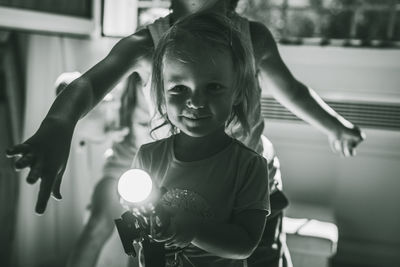 Portrait of cute girl at home