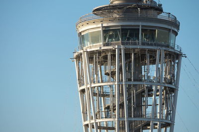 Low angle view of tower against blue sky