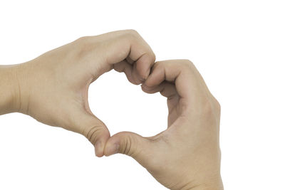 Close-up of man hand against white background