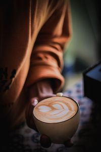 Midsection of coffee cup