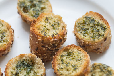 High angle view of baked breads in plate