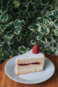 Close-up of cake served on table