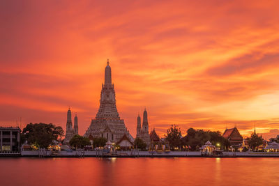 Pagoda against sky during sunset