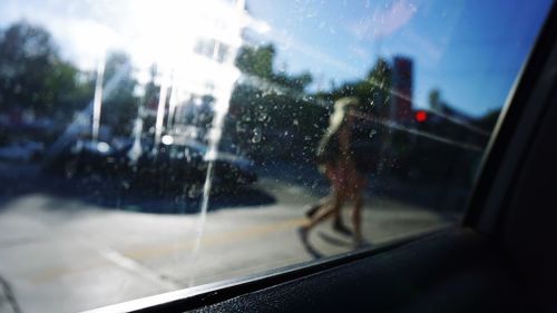 Road passing through car window