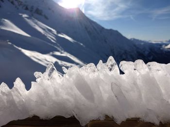 Close-up of snow mountains against sky