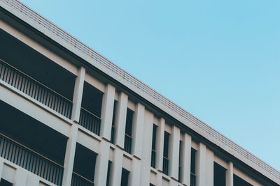 Low angle view of building against clear blue sky