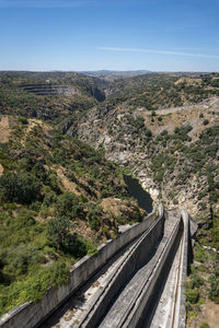 View across the valley from almendra  dam, also known as villarino dam, in salamanca, spain