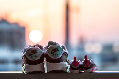 Close-up of shoes on table