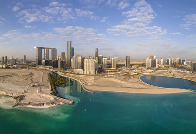 Aerial view on developing part of al reem island in abu dhabi on a cloudy day