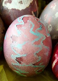 Close-up of multi colored easter eggs on table
