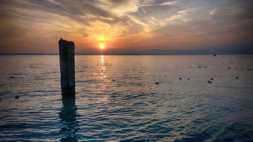 Scenic view of sea against romantic sky