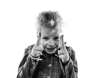 Portrait of boy against white background