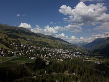 Aerial view of townscape against sky