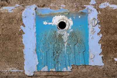 Close-up of blue metal door