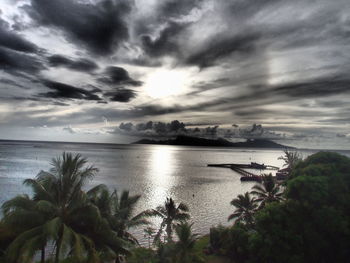 Scenic view of sea against cloudy sky