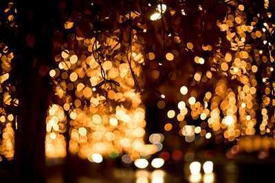 Defocused image of illuminated lights at night