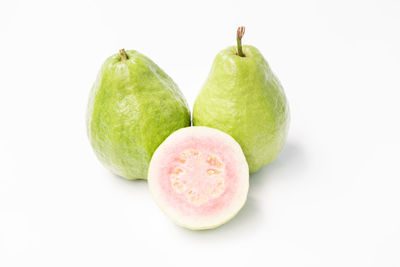 Close-up of fruits against white background