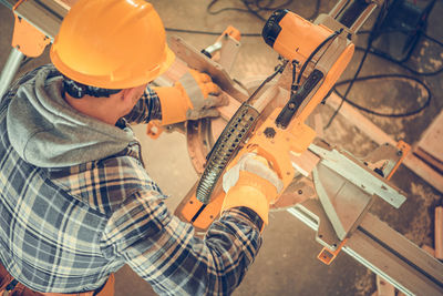 Man working on barbecue grill