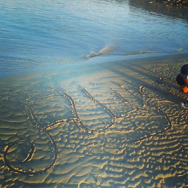 water, high angle view, beach, sand, rippled, shore, sea, nature, wet, tranquility, sunlight, wave, reflection, day, outdoors, waterfront, surf, beauty in nature, shadow, vacations