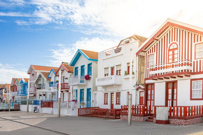 Buildings in city against sky