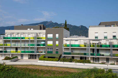 Buildings in city against sky