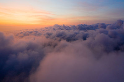 Low angle view of cloudscape against sky during sunset