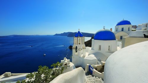 Panoramic view of sea against blue sky