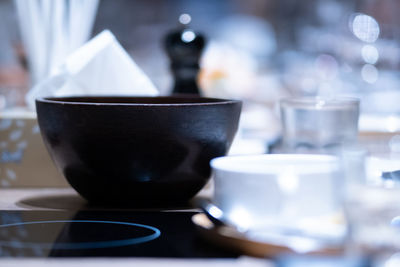 Close-up of coffee cup on table