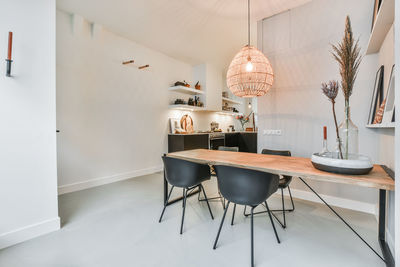 Empty chairs and table in restaurant