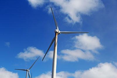 Low angle view of wind turbine against sky