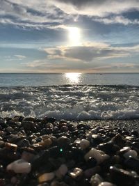 Scenic view of sea against sky during sunset