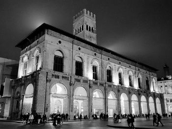 People in front of historical building