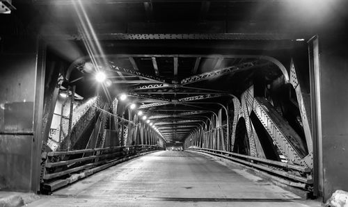 Bridge in illuminated tunnel