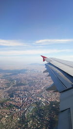 Aerial view of city against sky