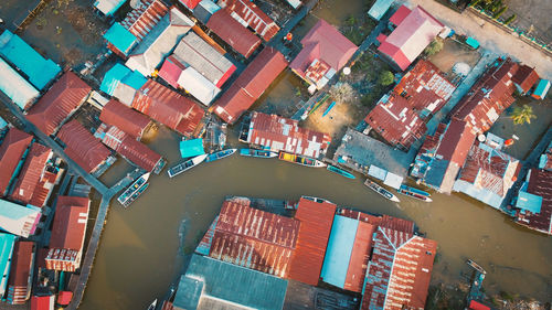 High angle view of illuminated buildings in city