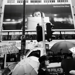 People on street in rain