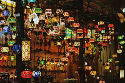Multi colored lanterns for sale in shop