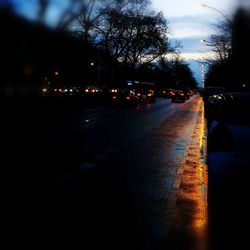 Cars on road against sky