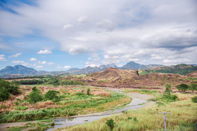 Vast valley of zambales in the philippines with its mountains in the bakground .