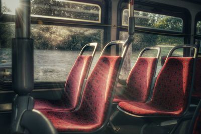 Close-up of empty seats in bus