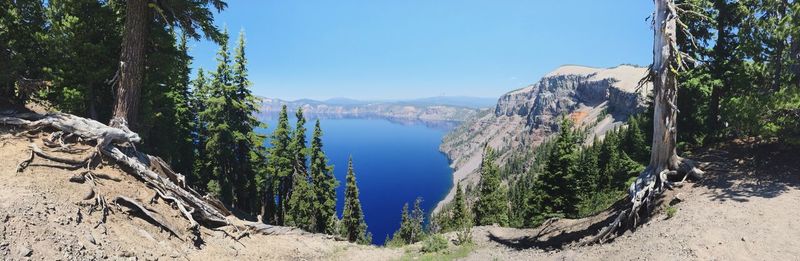 Panoramic view of crater lake against sky