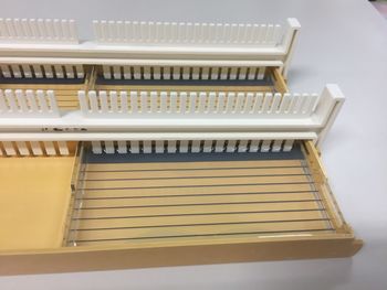 High angle view of piano on table