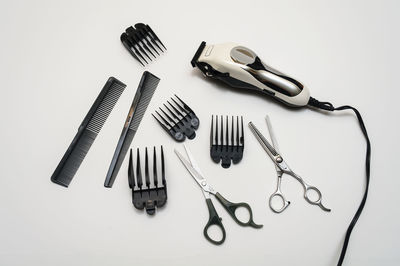 Hairdresser's tools on white background