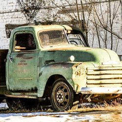 Vintage car parked on road