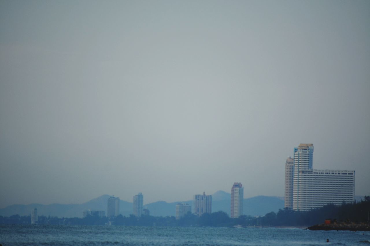 MODERN BUILDINGS AGAINST CLEAR SKY